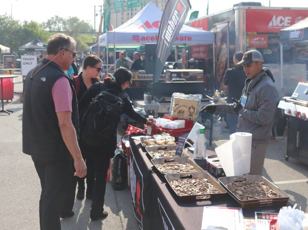 Outdoor street fest with grilled food being served
